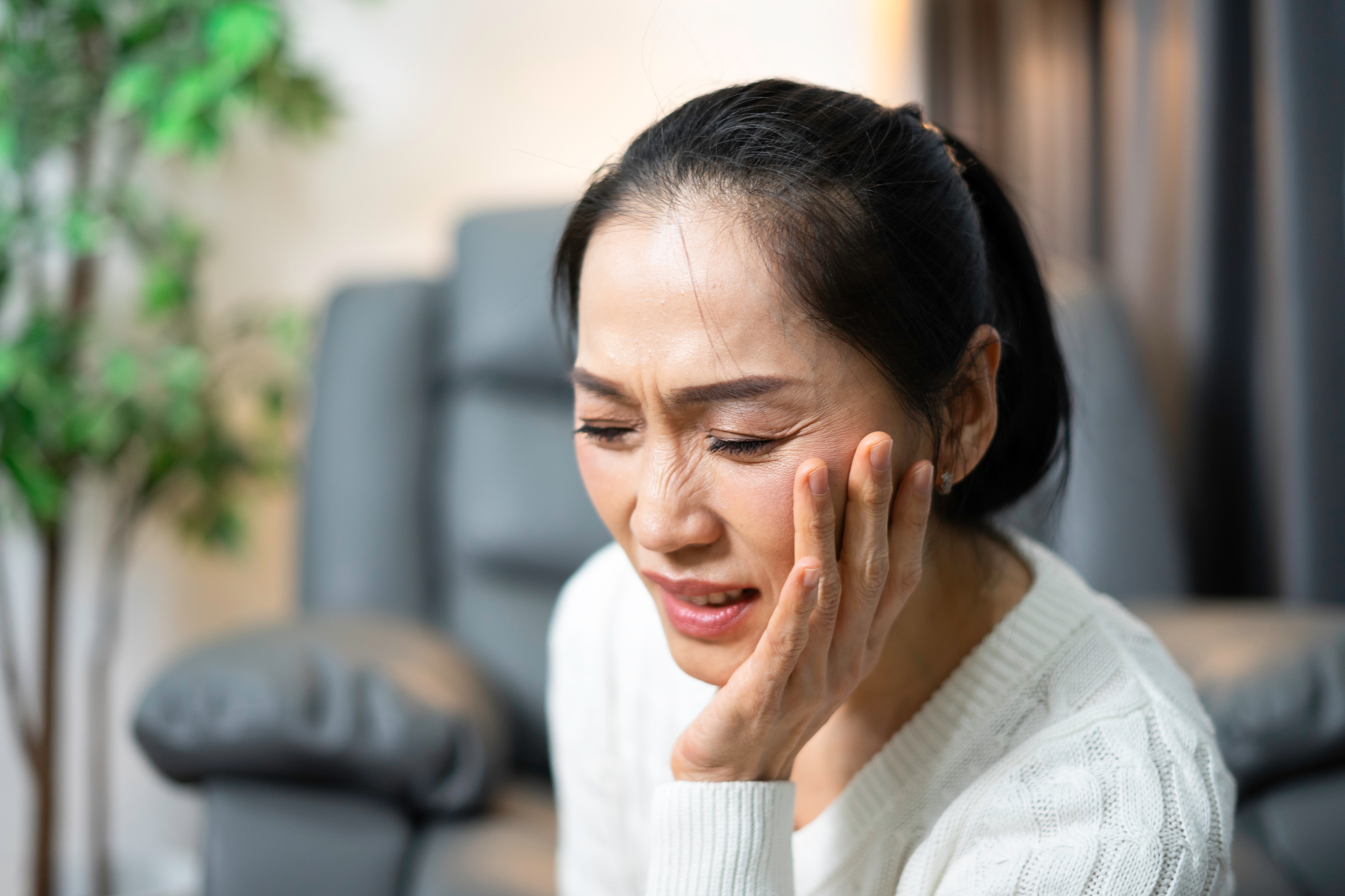 Woman brushing her teeth