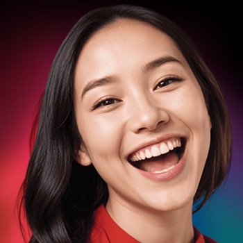 Woman smiling with her white teeth